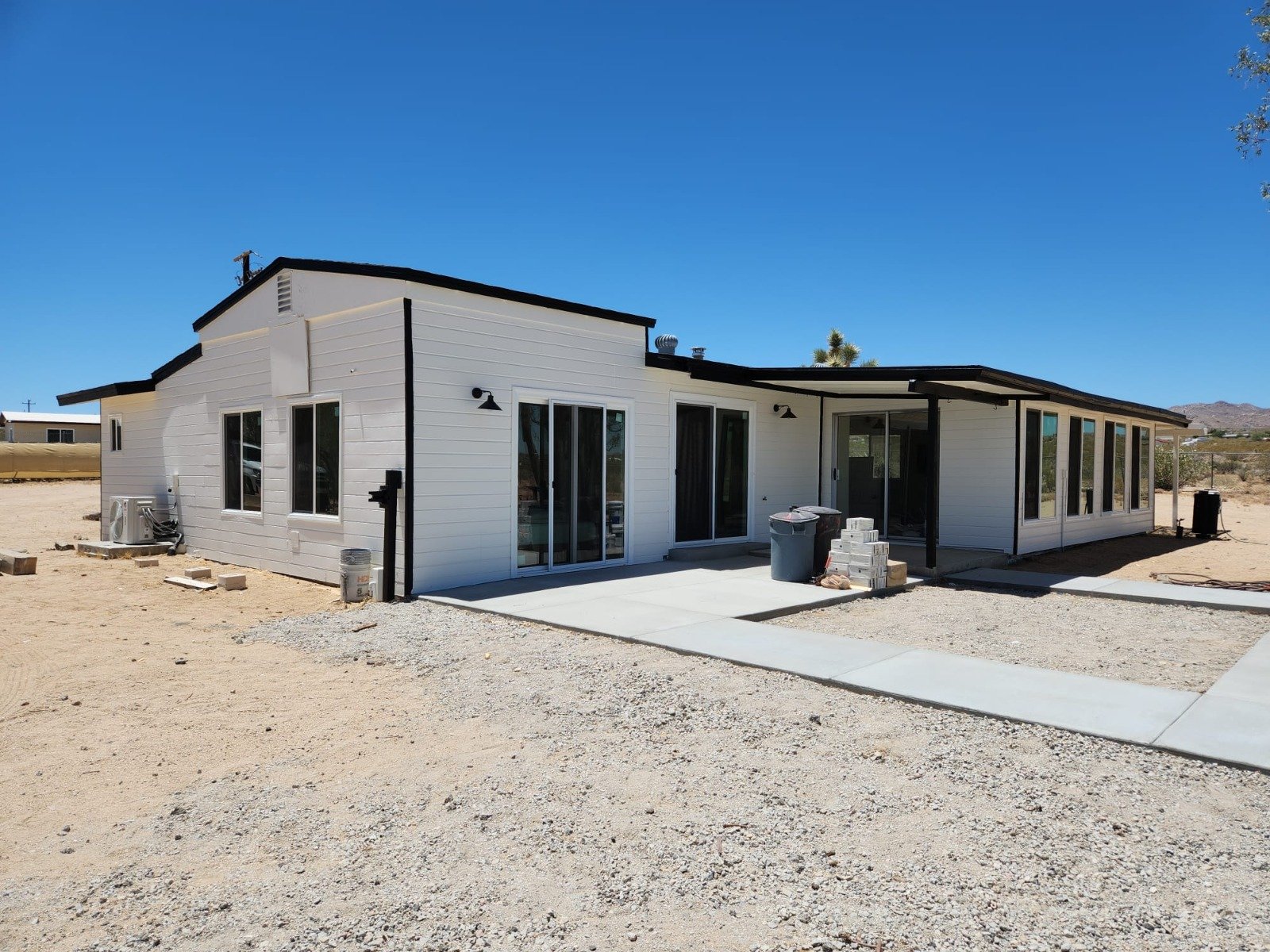 Professional house painters applying exterior paint in Oregon City OR